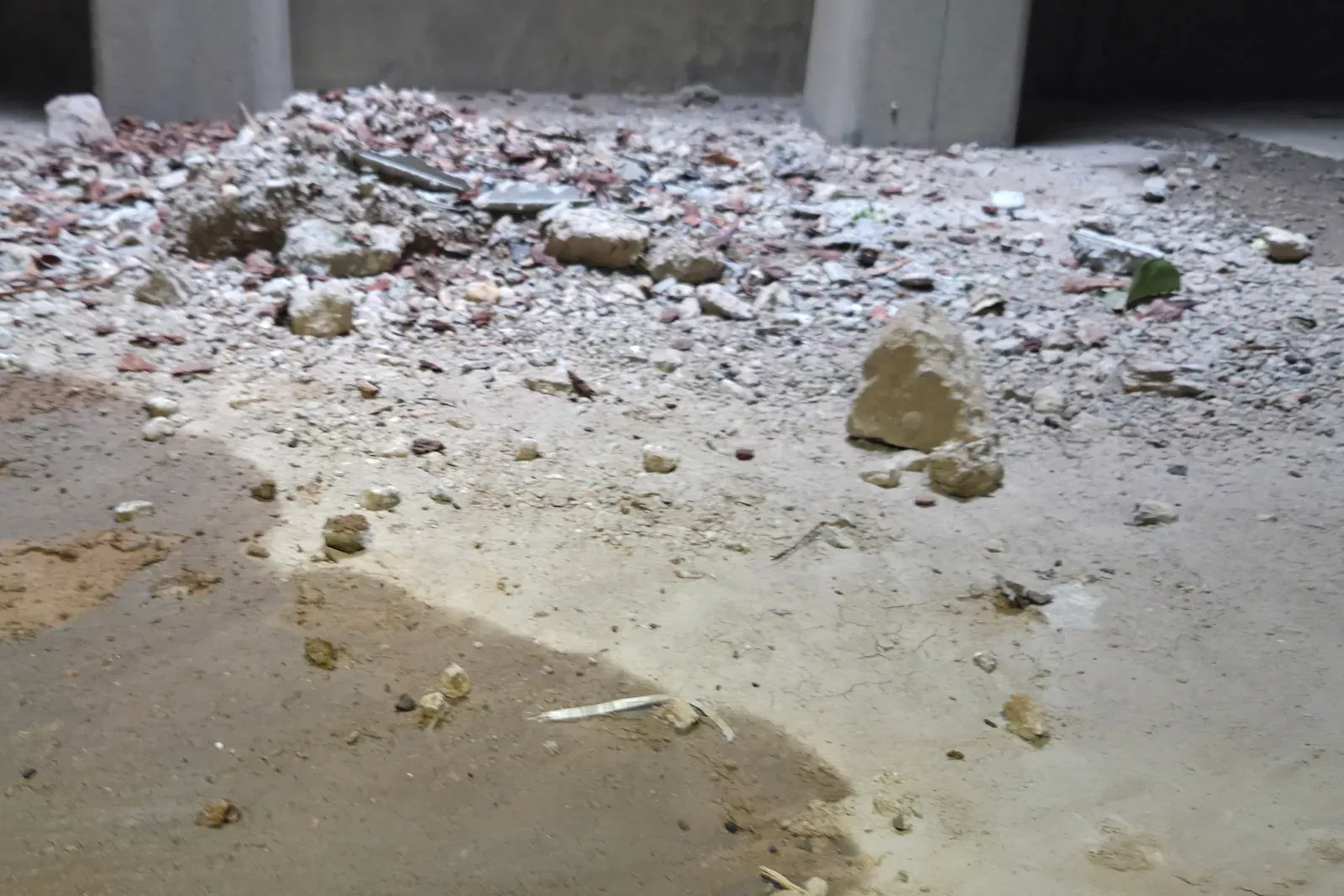 Debris and sediment inside an underground on-site detention tank before ASB Vac Services cleaning