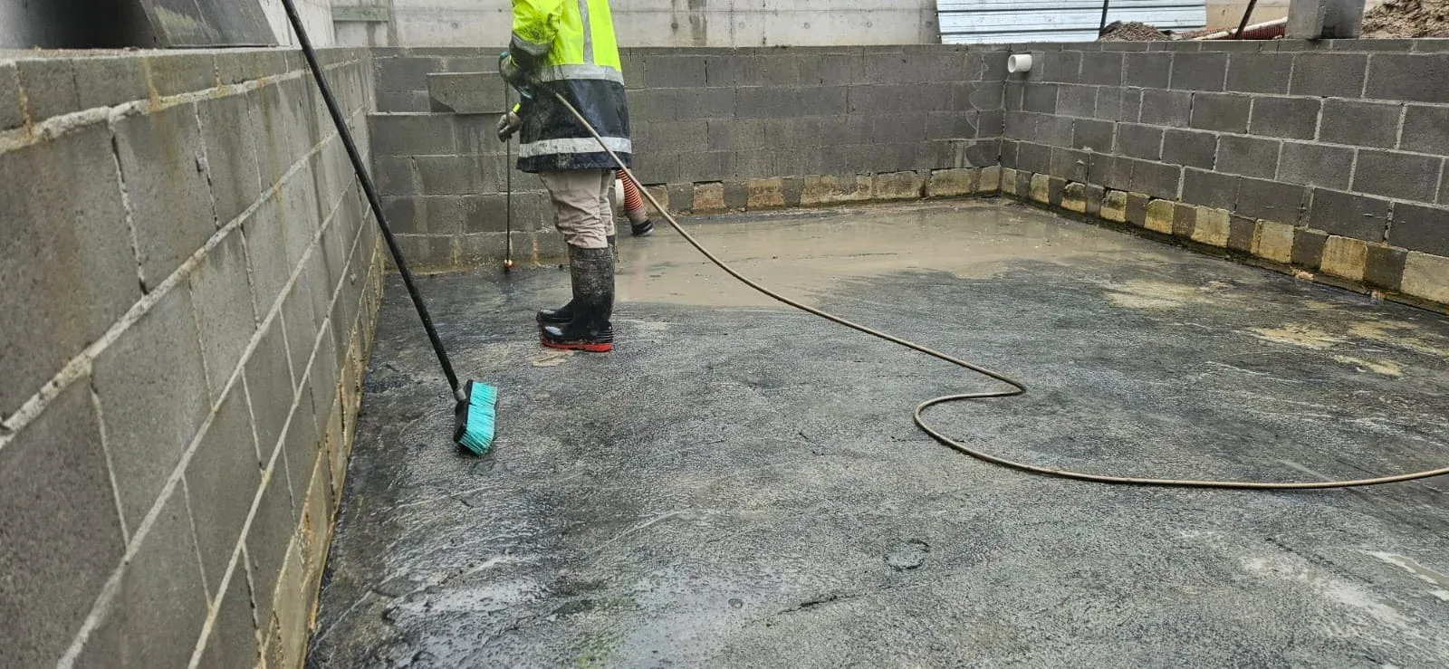 ASB Vac Services operator performing liquid waste tank cleaning in Sydney