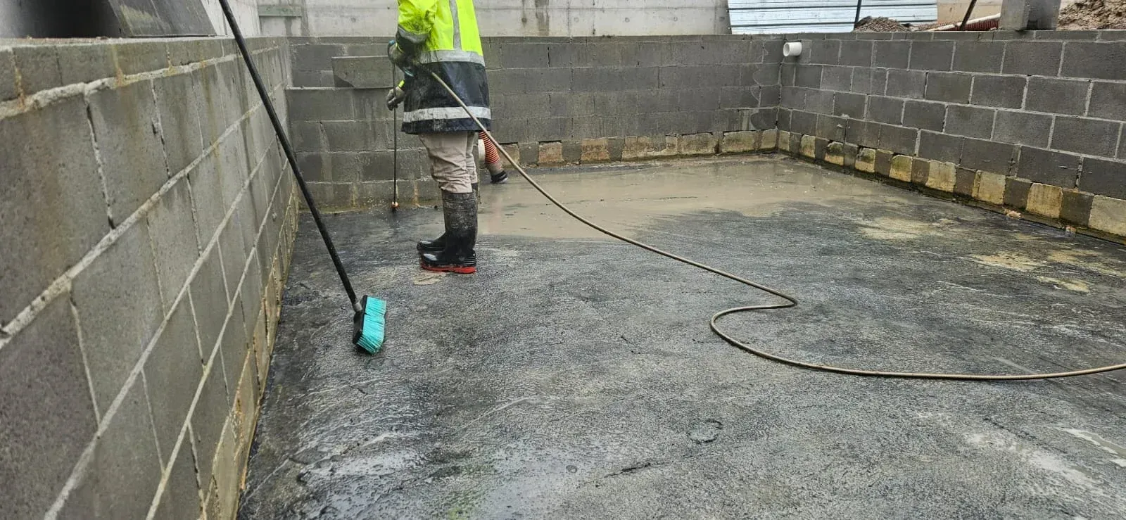 ASB Vac Services operator performing liquid waste tank cleaning in Sydney